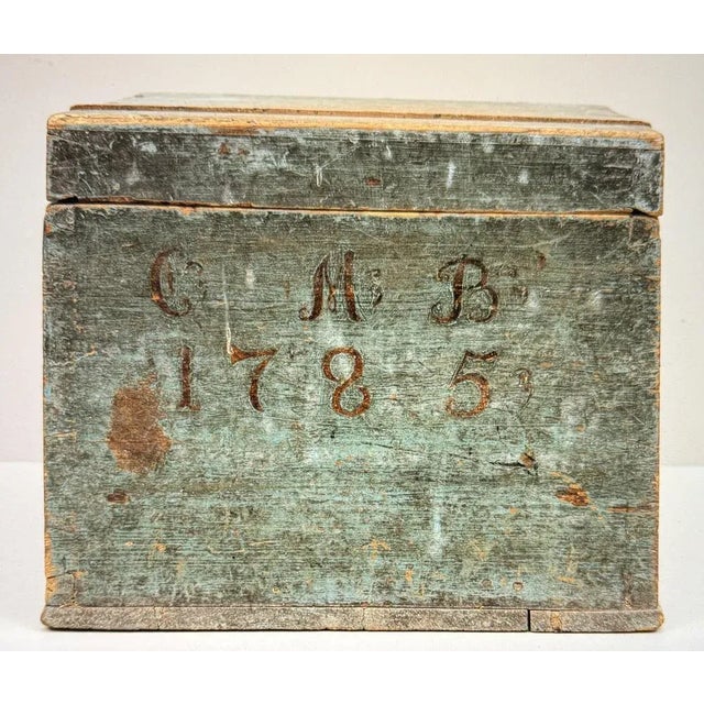 A blue-framed swedish chest from 1785 with the insignia c m b. The chest has its original color and signature. Its...