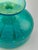 This turquoise and green decorative glass vase is a fine example of mid-century Maltese glass artistry, crafted in the...