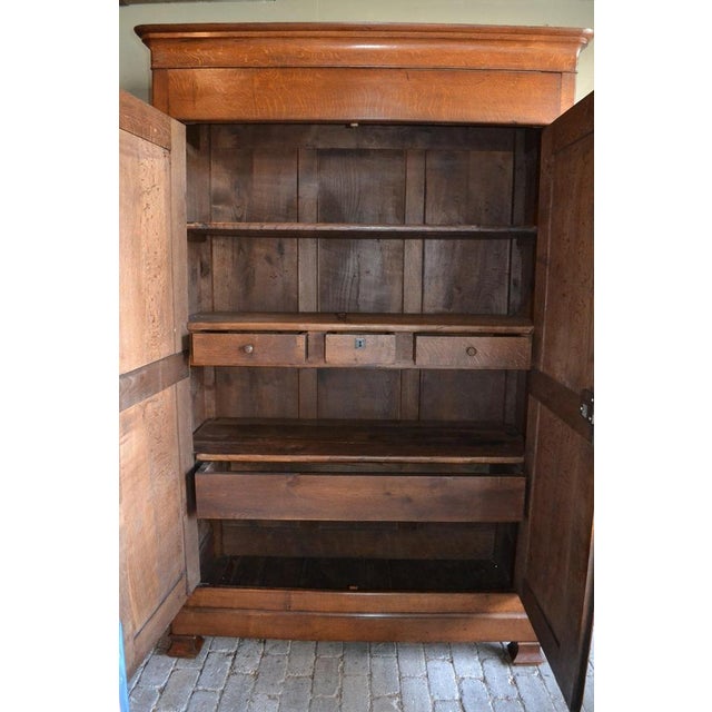 of a 19th-century French oak Louis Philippe cabinet. The height is 224 cm. The width is 147 cm. The depth is 60 cm. Fully...
