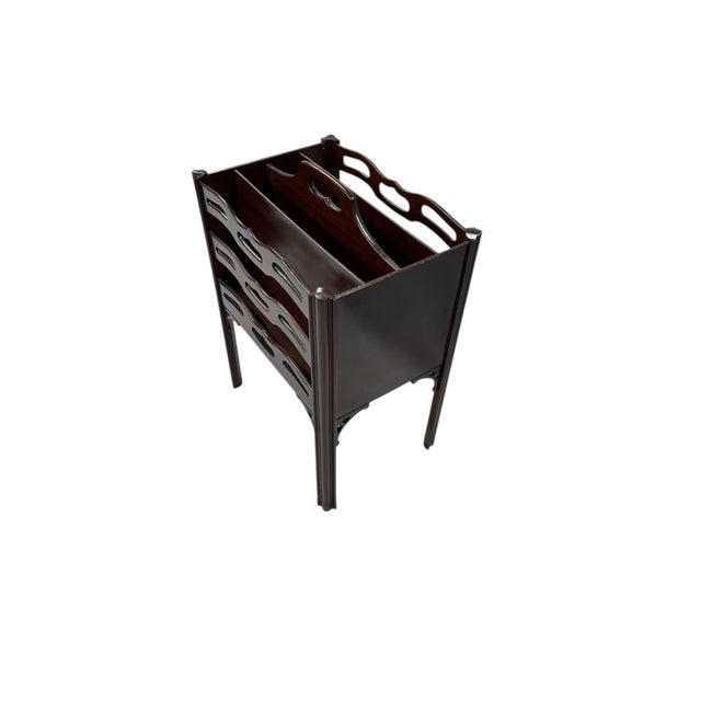 Mid Century mahogany tall Butler style #765 magazine rack. Four slots allow ample storage for reading materials. Measures...