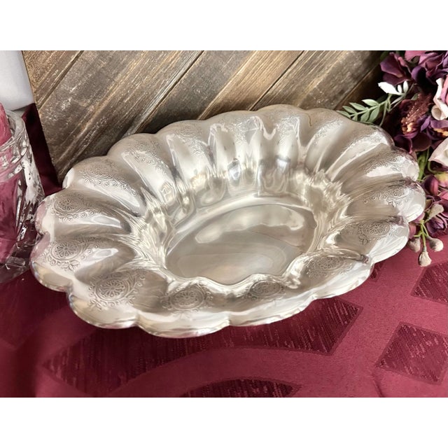 This is for a lovely Sterling Silver Bowl. The bowl is marked on the base with pattern 2082B, Sterling and a hallmark with...