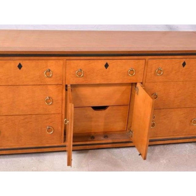 This is a Biedermeier style maple chest or credenza by National Mt. Airy. It is a versatile because it could work from...