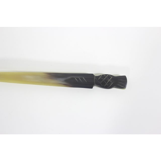 Vintage hand carved horn spoon with a Scottish thistle on the handle (I think they look like pineapples). Excellent...