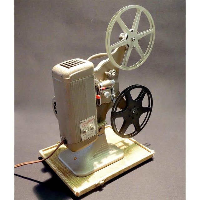 Submitted for your evaluation is this circa 1933, 8mm movie projector, by The Keystone Company. All factory original with...