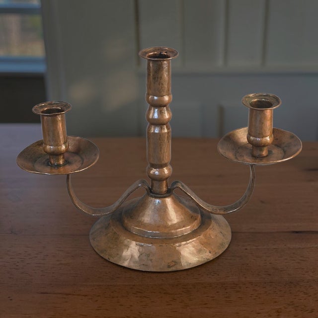 This vintage hand hammered copper three light candle holder exudes a unique Arts & Crafts Movement style, making it a...