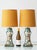 A pair of rare hand-painted faience table lamps built on twin-handled "ear" vases from the Arnhemsche Fayencefabriek. Both...
