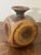 A charming vintage mid-century modern studio ceramic vase with a playful, highly considered form. This piece takes on a...