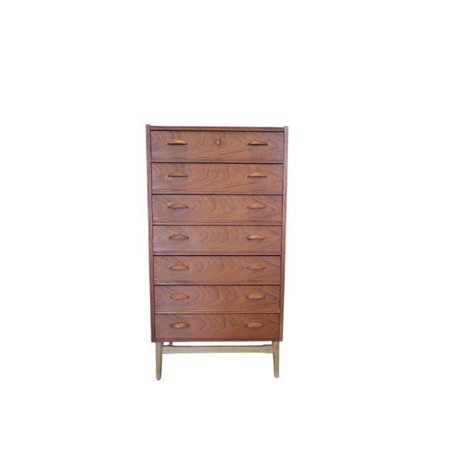 A well-built Danish chest of drawers in an unusually slim and stylish model. with a width of only 64 cm and a height of...