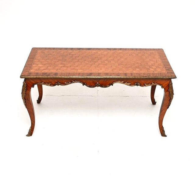A very beautiful and elegant antique French inlaid coffee table, this dates from around the 1920’s. It is of superb...