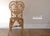 Gorgeous vintage 1970s boho heart back chair with bamboo and rattan. Beautiful scroll details adorn this piece from top to...
