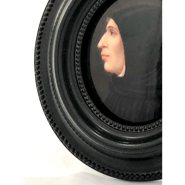 The painting is a meticulous, scaled-down replica on a porcelain plaque of the famous Renaissance oil painting, “Portrait...