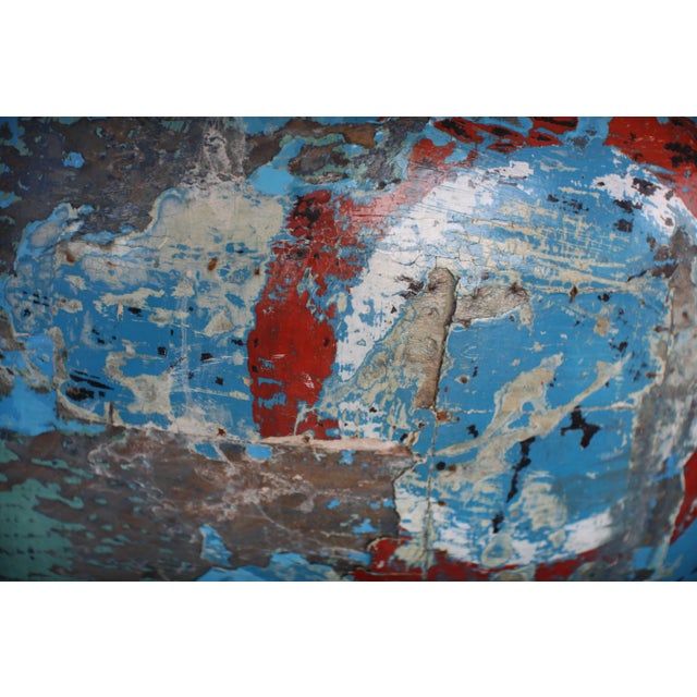 An old painted wood Asian bell. It is beautifully painted in vibrant colors. There are numerous repairs and quite a bit of...