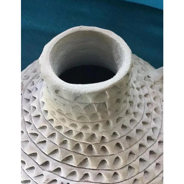 Jessie Garcia is recognized, along with her contemporaries Lucy Lewis and Mario Chino, as one of the most influential...