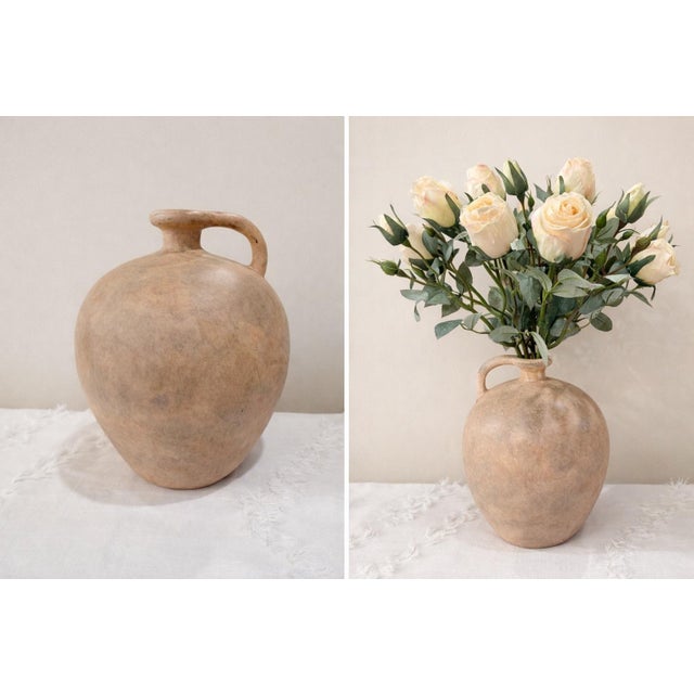 vintage terracotta jug vase . classic rounded jug shape with natural clay finish. Condition: Excellent condition with a...