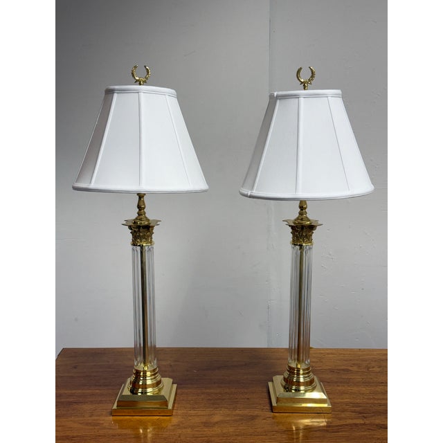 Design Plus Gallery presents a pair of Crystal Corinthian Column Table Lamps from Remington Lamp. These Neoclassical-...