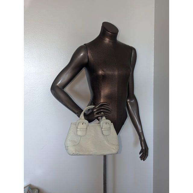 Vintage Cole Hahn cornflower blue or lighter blue. Leather embossed in an alligator pattern.