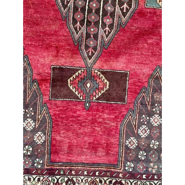 Midcentury tribal rug with geometric design and nice colors, entirely hand knotted with wool velvet on cotton foundation.