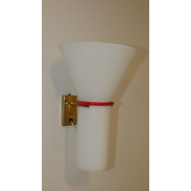 Wall lamps produced in Murano around the late 1960s or early 1970s. Iconic pieces of Venetian design, featuring a...