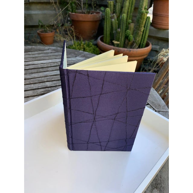 This is a vintage hand-made silk-fabric covered journal filled with blank paper inside. Journals are perfect for a...