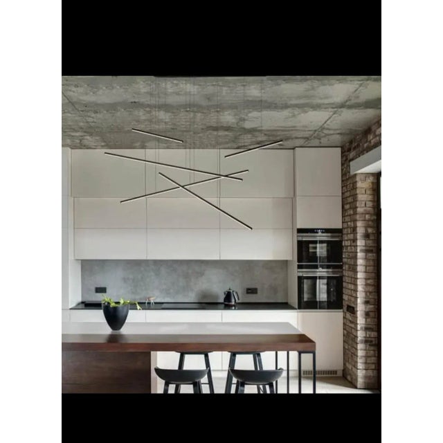 Stunning understated design with five thin linear light sources, from Canadian brand Kuzco Lighting. The modern black...
