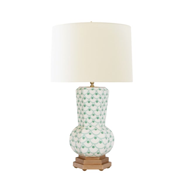 Brighten your space with this charming hand-painted tole lamp featuring a whimsical gourd silhouette in green with gold...