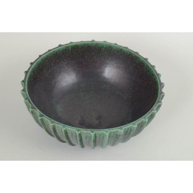 Arne Bang Bowl, model 189, 1940s. Strongly modelled Art Deco stoneware bowl with pronounced vertical fluting and a deep...