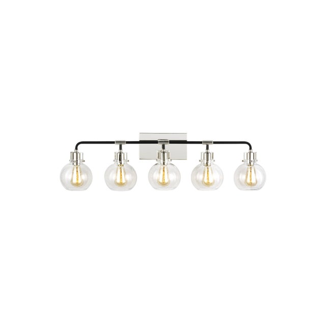 Clara features Clear Seeded glass shades that subtly diffuse the lamping while allowing the exposed bulb to be a central...