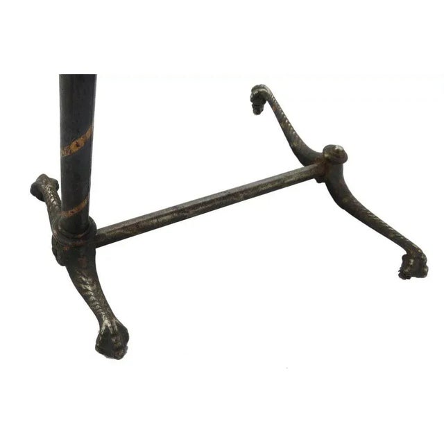 T. 779 American copper anodized reading table. Leather tooled top. c 1900 top 27 1/2" by 17" adjustable height