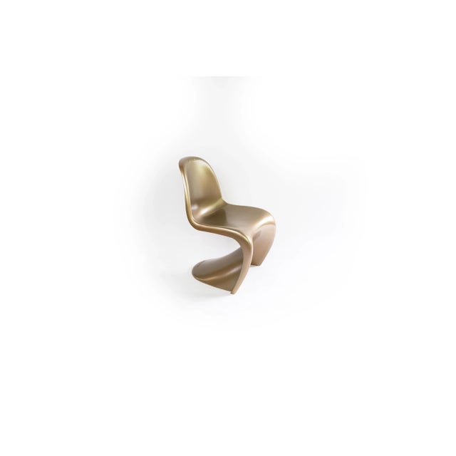 Panton Chair in Gold from Vitra, 1990s, in Good conditions. Designed 1990 to 1999 This piece has an attribution mark, I am...