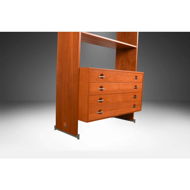 A remarkable teak, freestanding, modular, room divider, bookcase, storage cabinet, made in Denmark attributed to Hans...