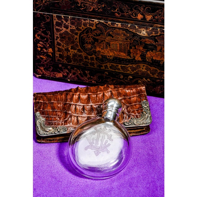 A beautiful piece of Victorian elegance, this antique 1879 scent bottle flask is a striking example of 19th-century...