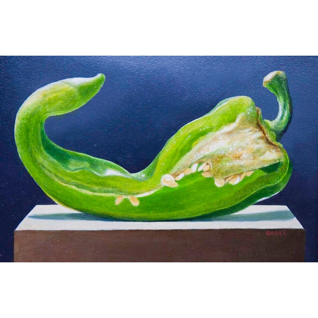 Anaheim by Thane Gorek | Oil on board Green pepper on a wooden surface against a dark background For Sale