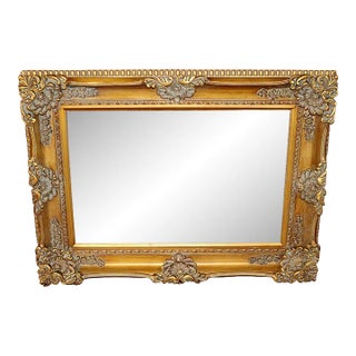 French Style Carved Gold Beveled Glass Mirror For Sale