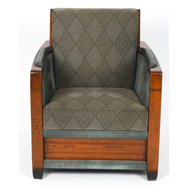 A delightful Dutch art deco lounge chair after Schuitema. Nicely upholstered in a modernist textured diamond pattern with...