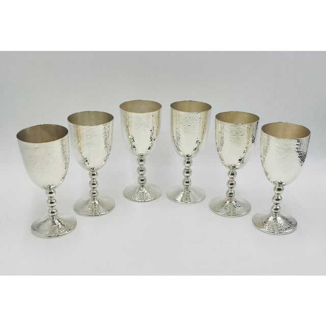 A sculptural and highly collectible set of six “Musical” wine or water goblets designed and manufactured in Taxco, Mexico...