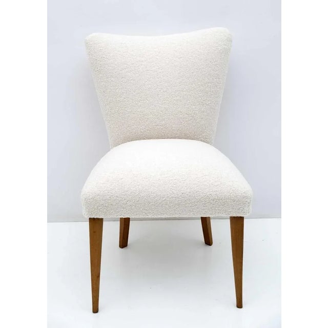 Mid-Century Modern armchair, Italian 1950s production, completely restored and covered in Boucle fabric. It adapts very...