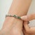 Handcrafted Emerald & Diamond Infinity Link Bracelet in 925 Sterling Silver For Sale - Image 11 of 14