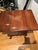 This table has drop leaf sides and two upper drawers with brass pulls. The drop leaf sides are supported with high quality...