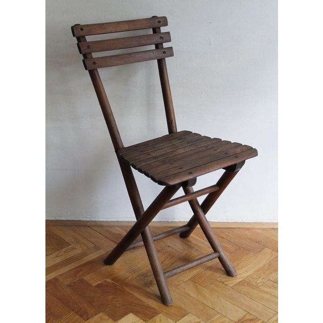 A rare folding garden chair originally designed by the Gebrüder Thonet company at the end of the 19th Century. It can be...