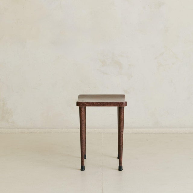 An Italian stool from the 1960s, crafted in lacquered goatskin parchment in the manner of Aldo Tura. The seat, softly...
