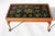 Custom English style black lacquer coffee table with mahogany legs. Made in the late 20th century.
