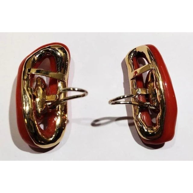 Natural Coral Loops and Freshwater Pearl Earrings set in 18K yellow gold. By Christopher Walling. Coral 15 g Pearls 5.5 g...