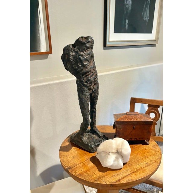 Abstract study of a male figure in a walking stance by artist Serge Monsau (French, 1930-2019). This sculpture has a...