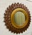 A stunning & rare extra large sunburst mirror 52” wide. Beautiful chocolate brown and gold color. The mirror is 24” x 24”...