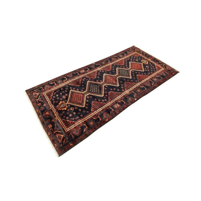 Classic Rug from the 1960s from the city of Hamadan. Wonderful Flor with several means medallions in dark blue -, red,...