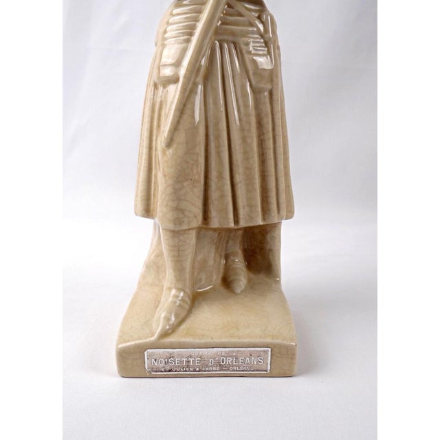 Joan of Arc crackle-glazed earthenware liqueur decanter from the 1950s A saintly figure, to protect the liqueur. Created...