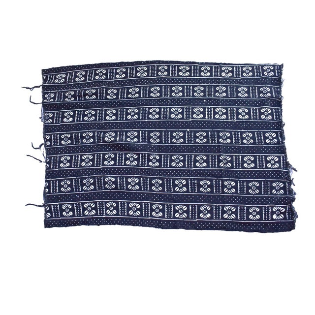 Bogolan or Bogolanfini is a Malian name for the traditional African mud cloth made in Mali. In the Bamana language, the...