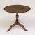 Beautiful bleached brown oak top with appropriate patina Supported by a turned pedestal and three legs in the shape of...