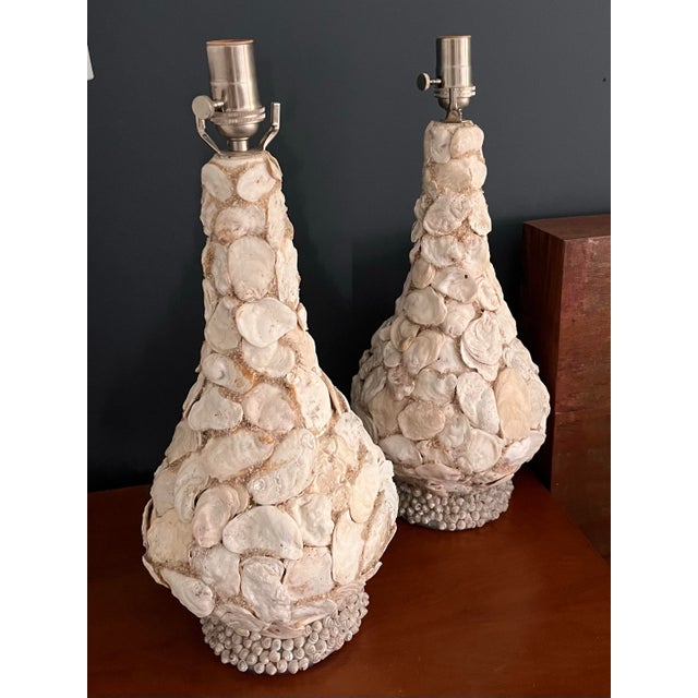 This gorgeous set of seashell encrusted lamps was plucked from an estate sale in coastal Maine. The alabaster tones of the...