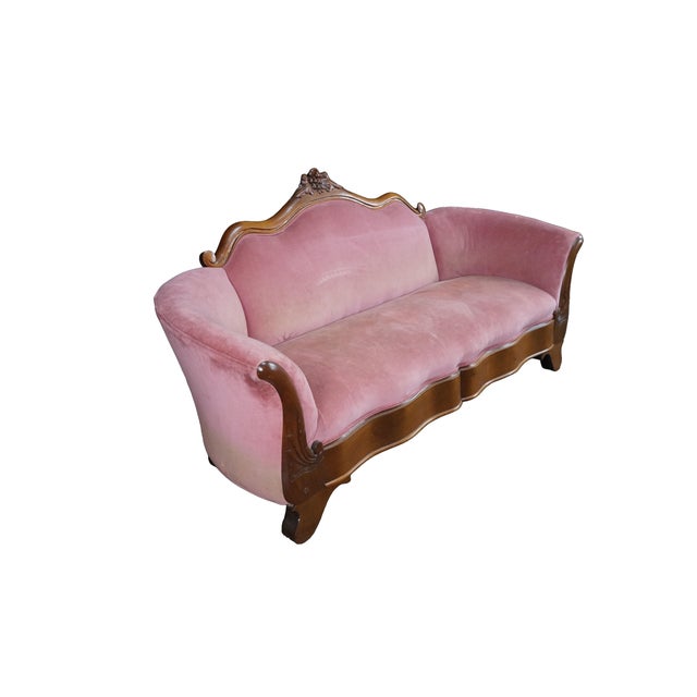 This exceptional mid-to-late 19th-century Victorian parlor sofa beautifully bridges the transition between the late Empire...